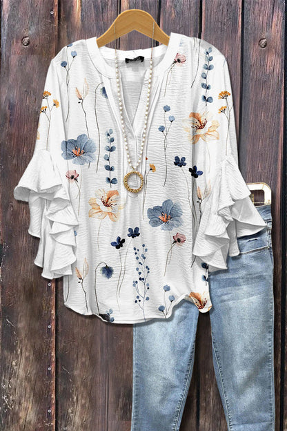 Florina™ - Blus med Blommönster, Volangärmar och Feminint Snitt