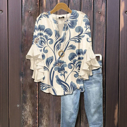 Florina™ - Blus med Blommönster, Volangärmar och Feminint Snitt